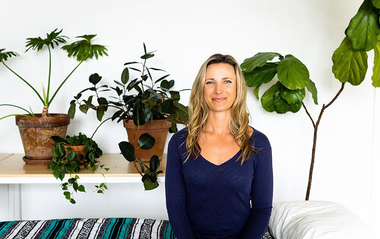 Kristen Gilbert with plants